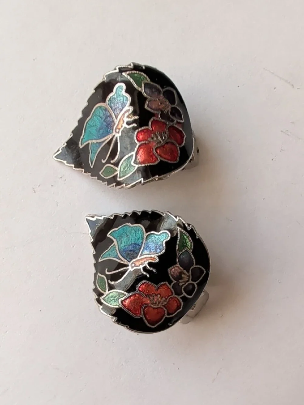 Enamel Floral Clip-On Earrings in Black with Red & Blue Accents